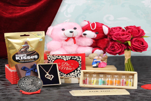 TIED RIBBONS Valentine gift hamper with teddy bears, chocolates, flowers, pendant and message bottle