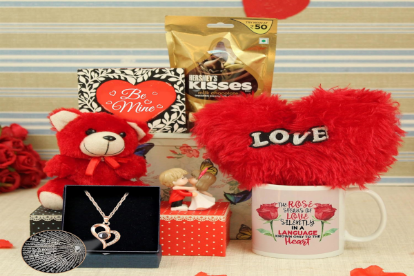 Romantic Valentine gift combo with teddy, mug, heart cushion, pendant necklace and chocolates